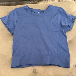 All in motion blue top